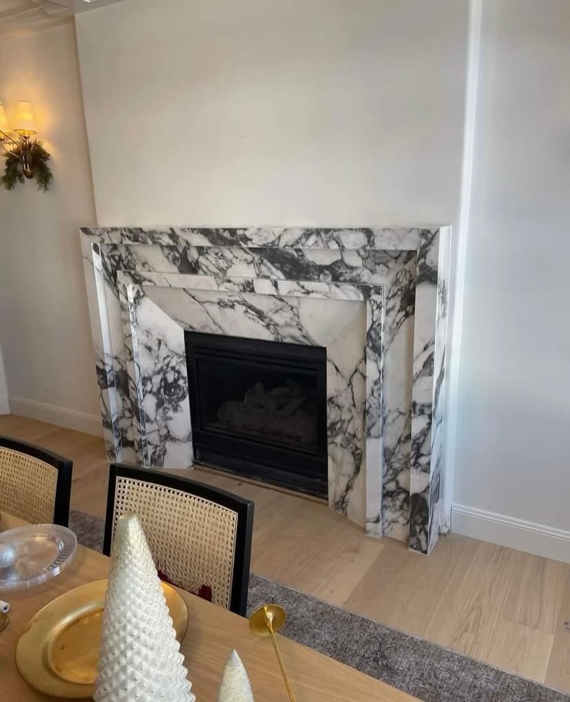 Arabescato Marble Fireplace Surround — custom stone countertop project by Indiana Stone Gallery, Indianapolis IN